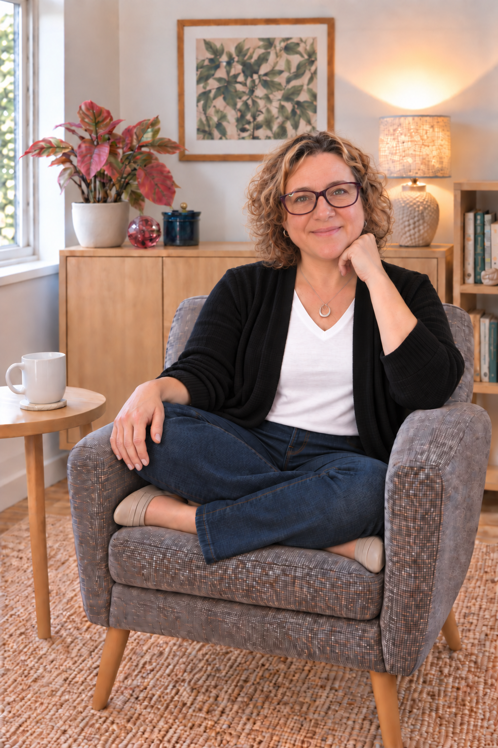 Stephanie Green, registered psychologist specialising in adult ADHD and AuDHD, seated in a warm office